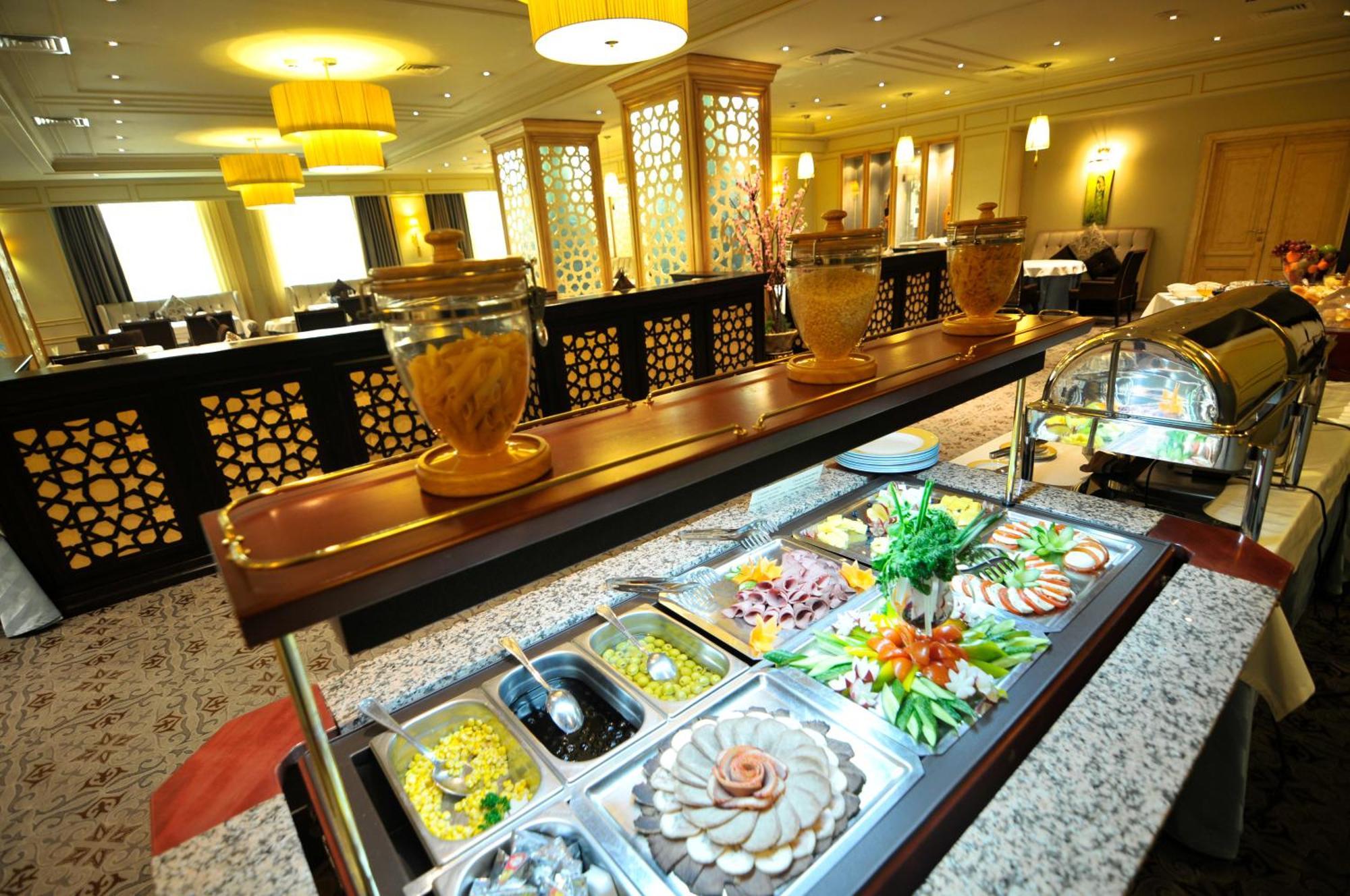 Grand Tien Shan Hotel Αλμάτι Εστιατόριο φωτογραφία