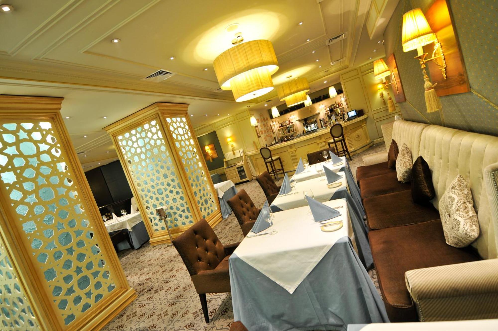 Grand Tien Shan Hotel Αλμάτι Εστιατόριο φωτογραφία
