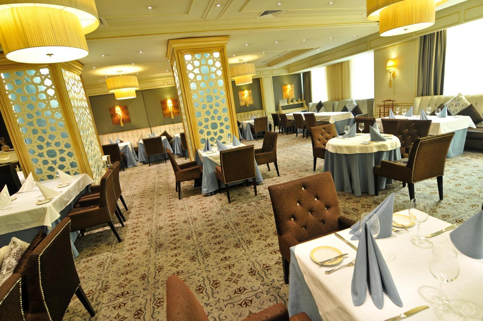 Grand Tien Shan Hotel Αλμάτι Εστιατόριο φωτογραφία